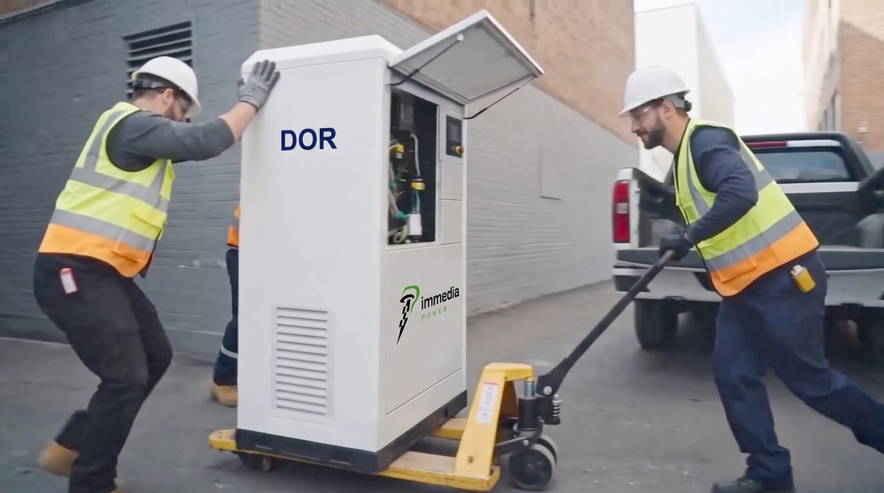 Workers moving a DOR unit on a pallet jack, no crane required